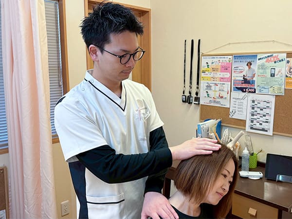首の施術