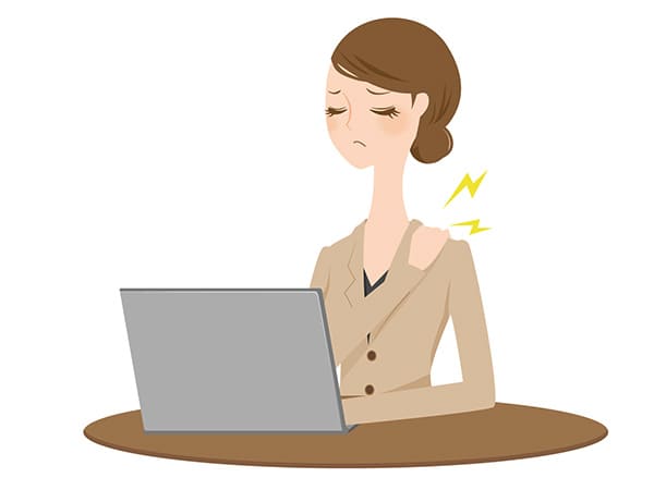 デスクワークで身体の痛みを感じる女性のイラスト